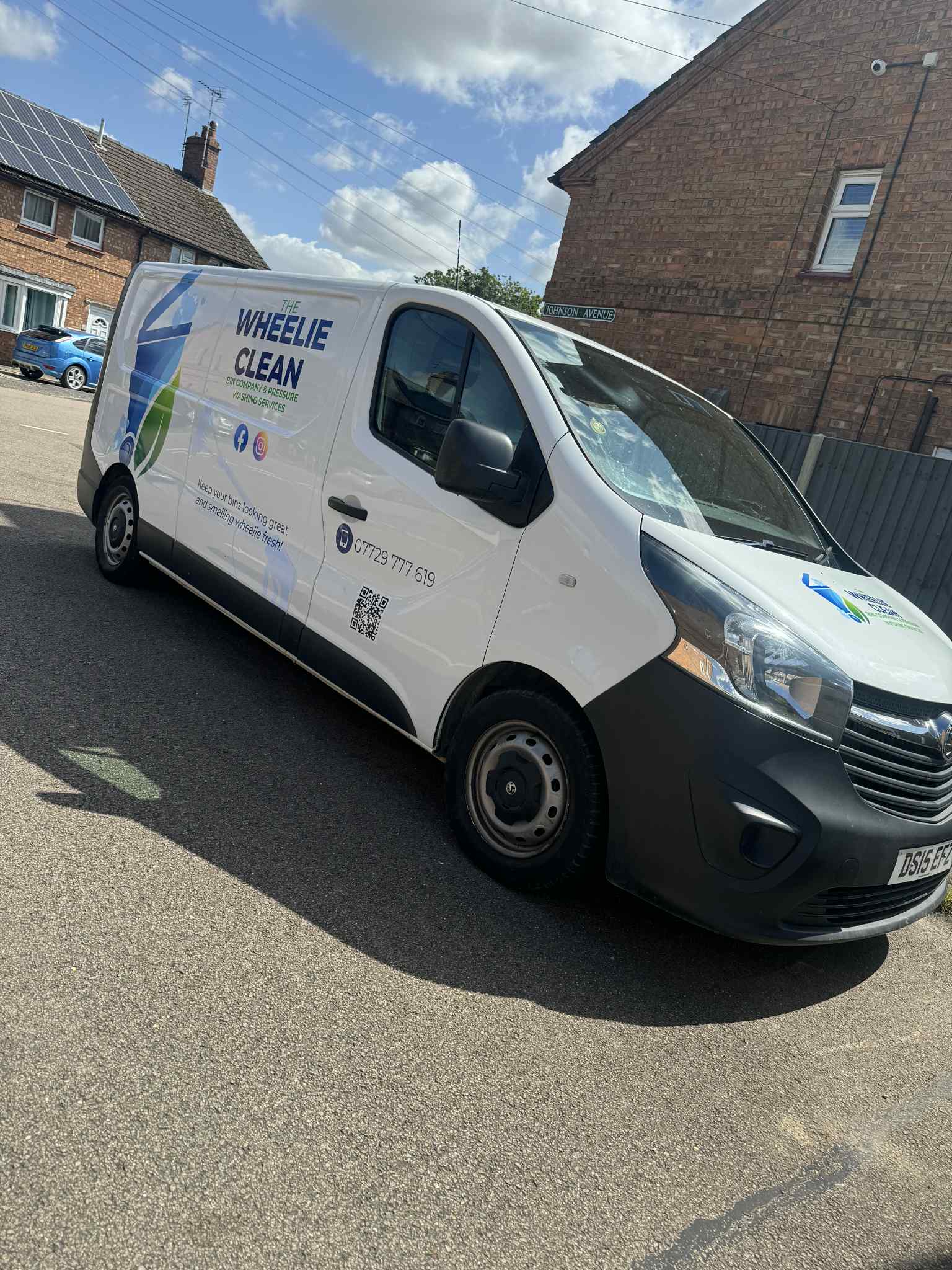 A picture of the Wheelie Clean Bin Company's signwritten van.
